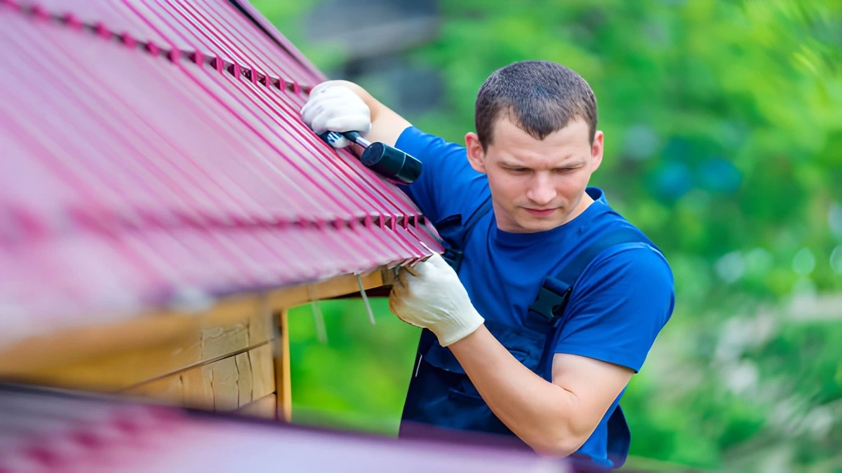  Professional installer fastening standing seam metal