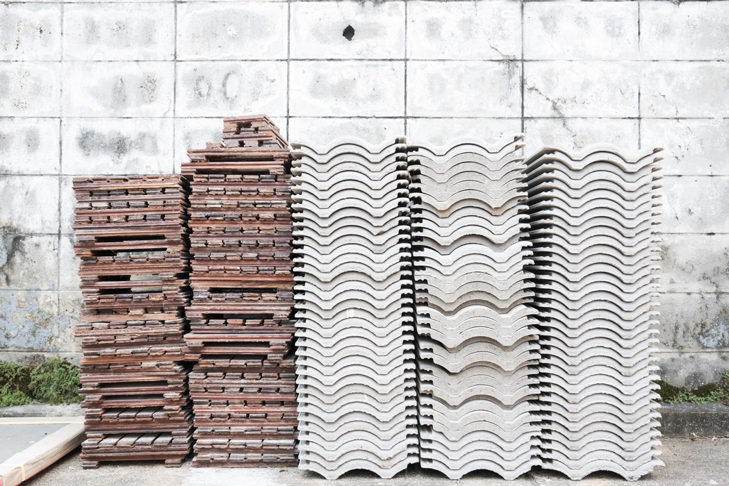Side-by-side comparison of asphalt shingles, metal roofing, and slate tiles