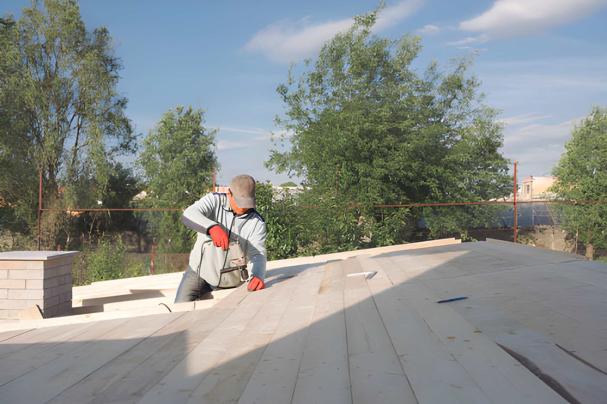 A professional installing a roof on a mobile home