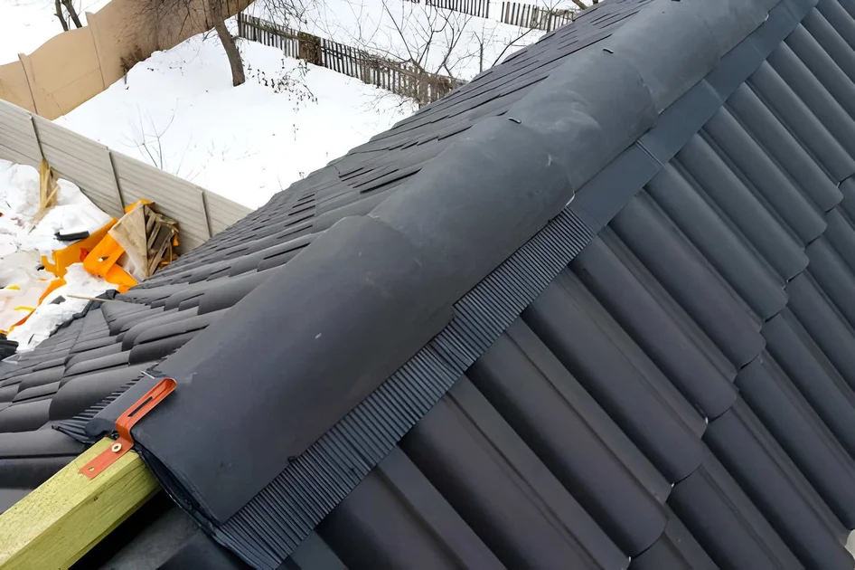ridge cap shingles running along roof peak with architectural detail ridge cap shingles running along roof peak with architectural detail